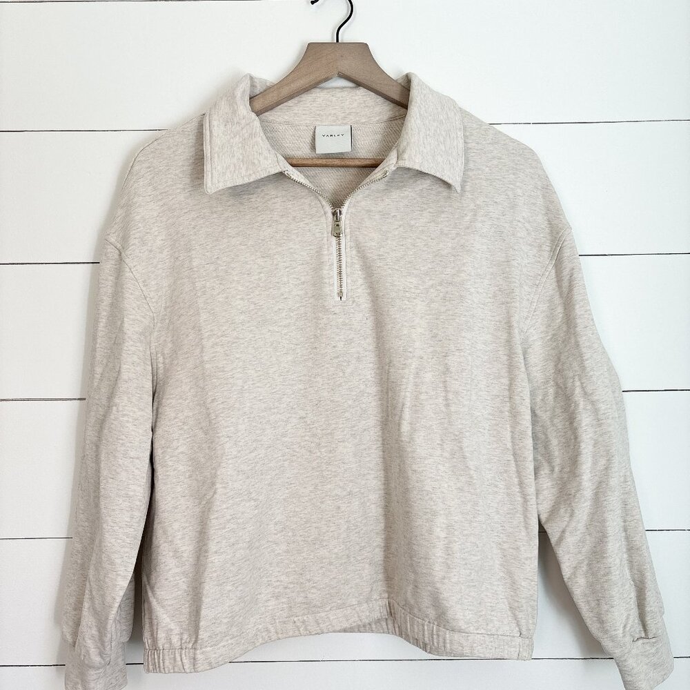Varley women’s beige 1/2 zip shorter style long sleeve top Size medium